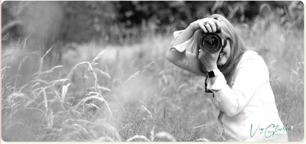 Photographer with canaon camera shooting in an Irish field | Vig Gleeson personal brand photography | Limerick 