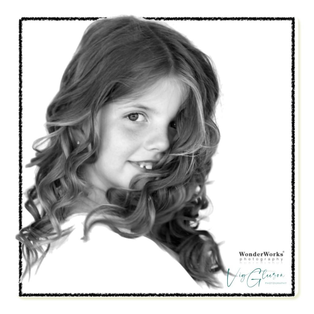 Photograph of girl making her Communion in Ireland Communion and Confirmation photographs at your own venue from. All your photos on a CD for you to can make all the prints you want. Perfect for gifts, thank you cards, your own walls, and albums. By Vig Gleeson Photography, Limerick.