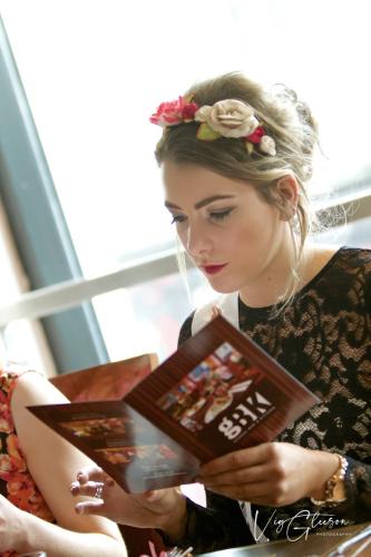 The Limerick Rose at The George | Irish woman with flower crown in restaurant reading menu | EVENT PHOTOGRAPHY | The George Restaurant and Hotel Limerick 